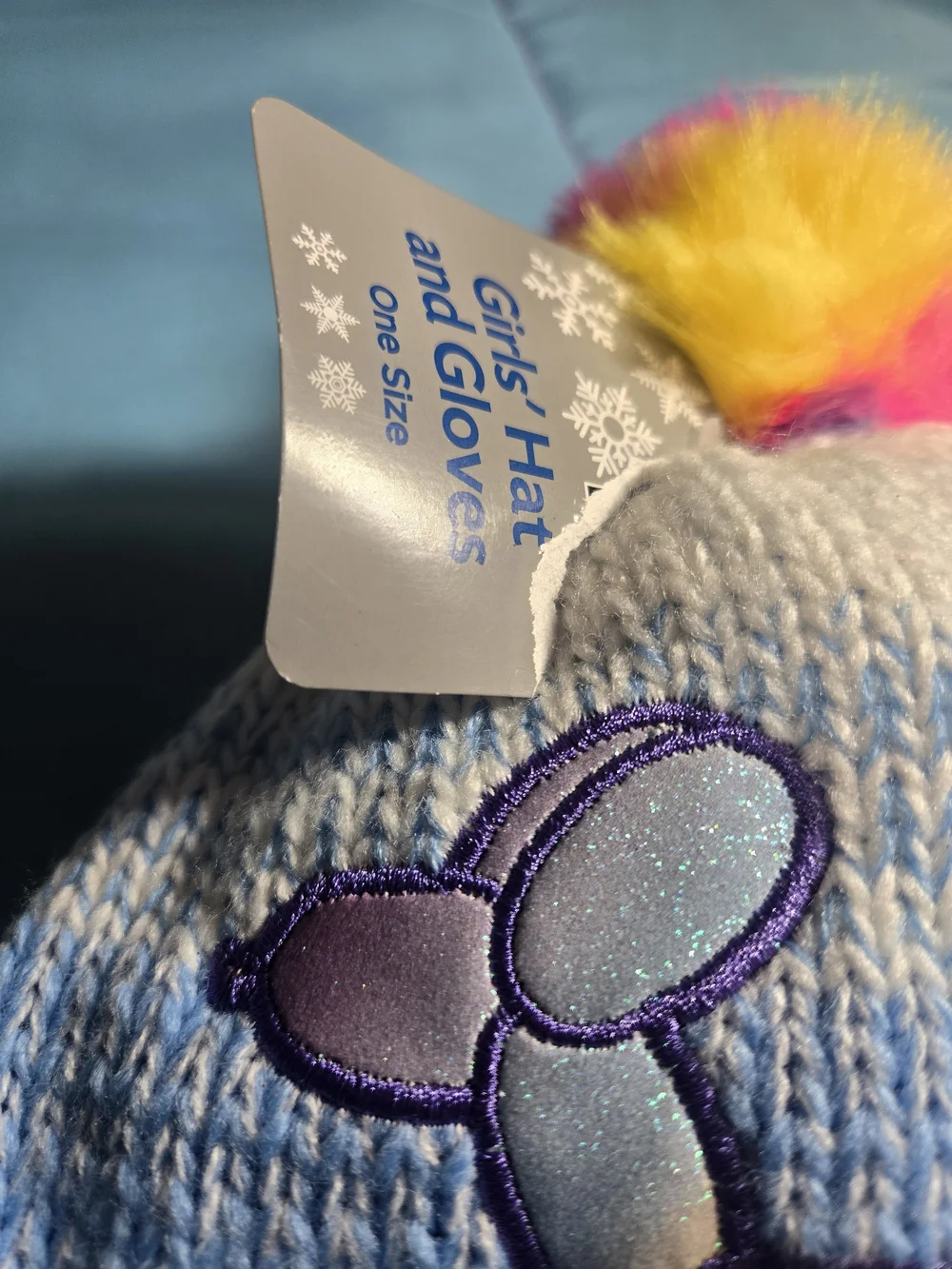 Girls' Light Blue Knit Beanie with Colorful Pom-Pom and Balloon Dog Patch